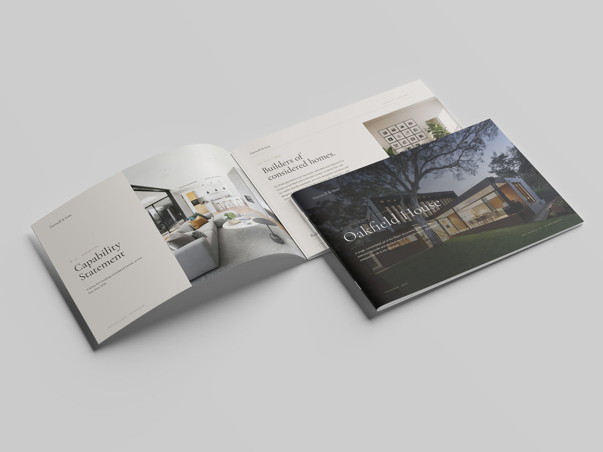 Building Contractor Project Pack in PowerPoint, printed and open at the first pages