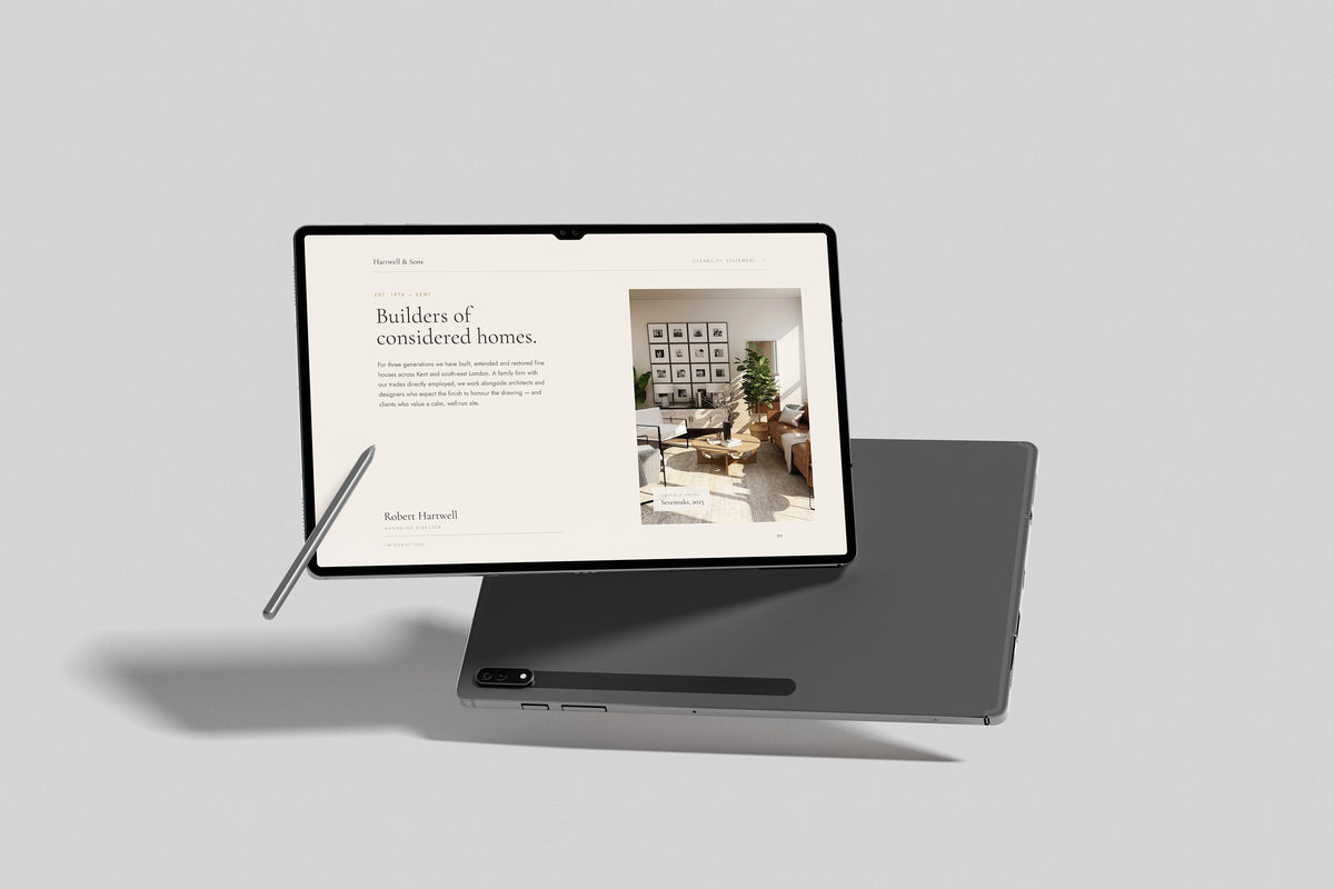 Building Contractor Project Pack in PowerPoint, inside pages shown on a tablet