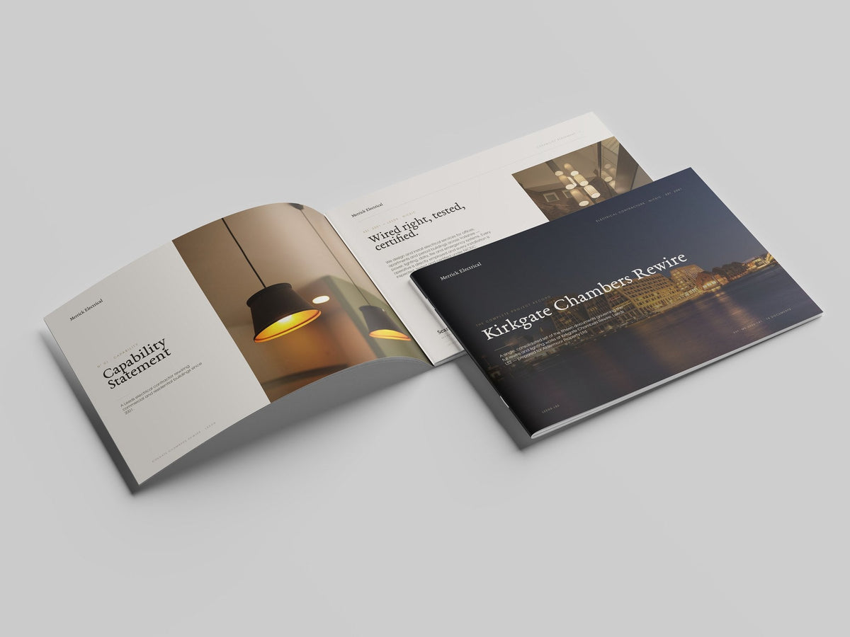 Electrician Project Pack in PowerPoint, printed and open at the first pages