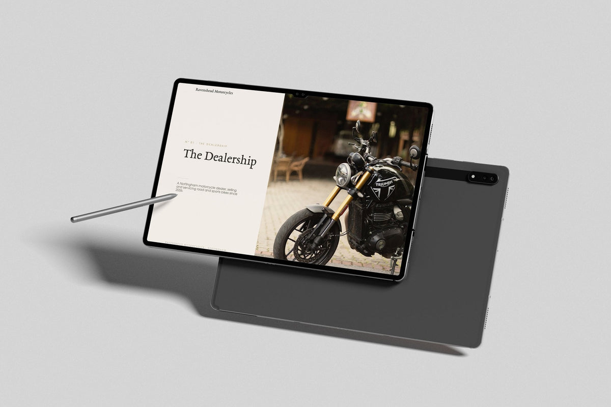 Motorcycle Dealer Customer Pack in PowerPoint, inside pages shown on a tablet