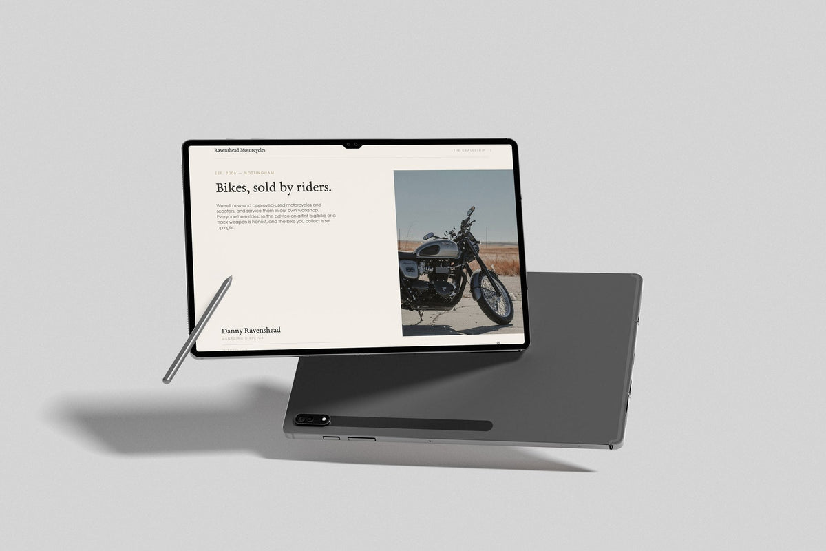 Motorcycle Dealer Customer Pack in PowerPoint, inside pages shown on a tablet