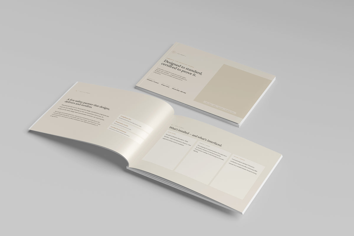 Beige Commercial Fire Protection Proposal Template in PowerPoint, printed cover shown at an angle