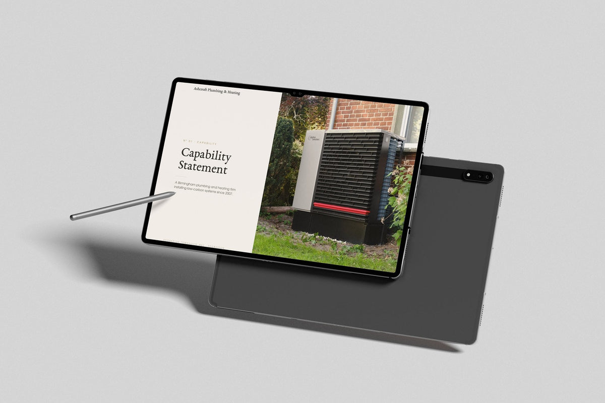 Plumbing & Heating Engineer Project Pack in PowerPoint, inside pages shown on a tablet