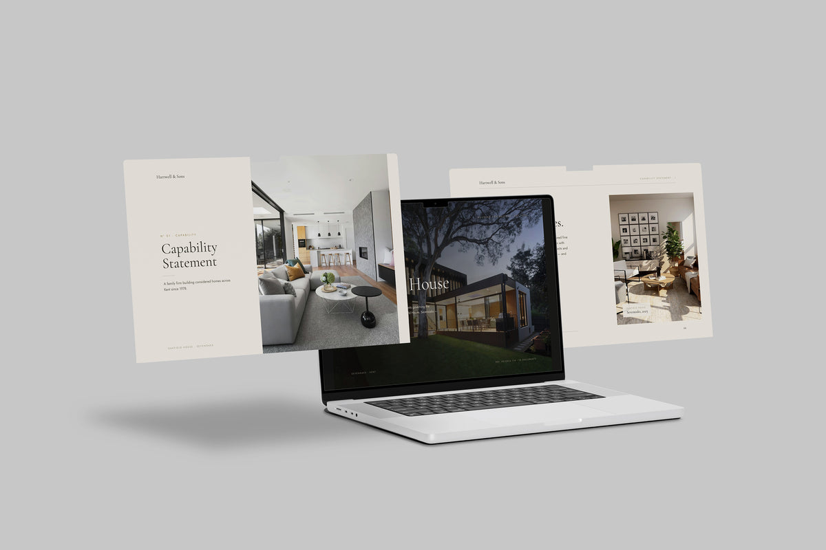 Building Contractor Project Pack in PowerPoint, shown on laptop screens