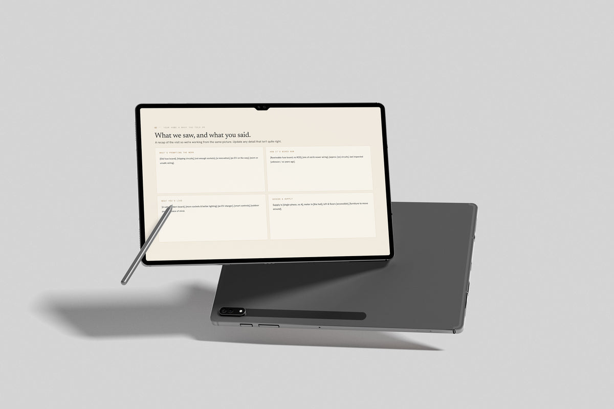 Beige Residential Electrician Proposal Template in PowerPoint, inside pages shown on a tablet