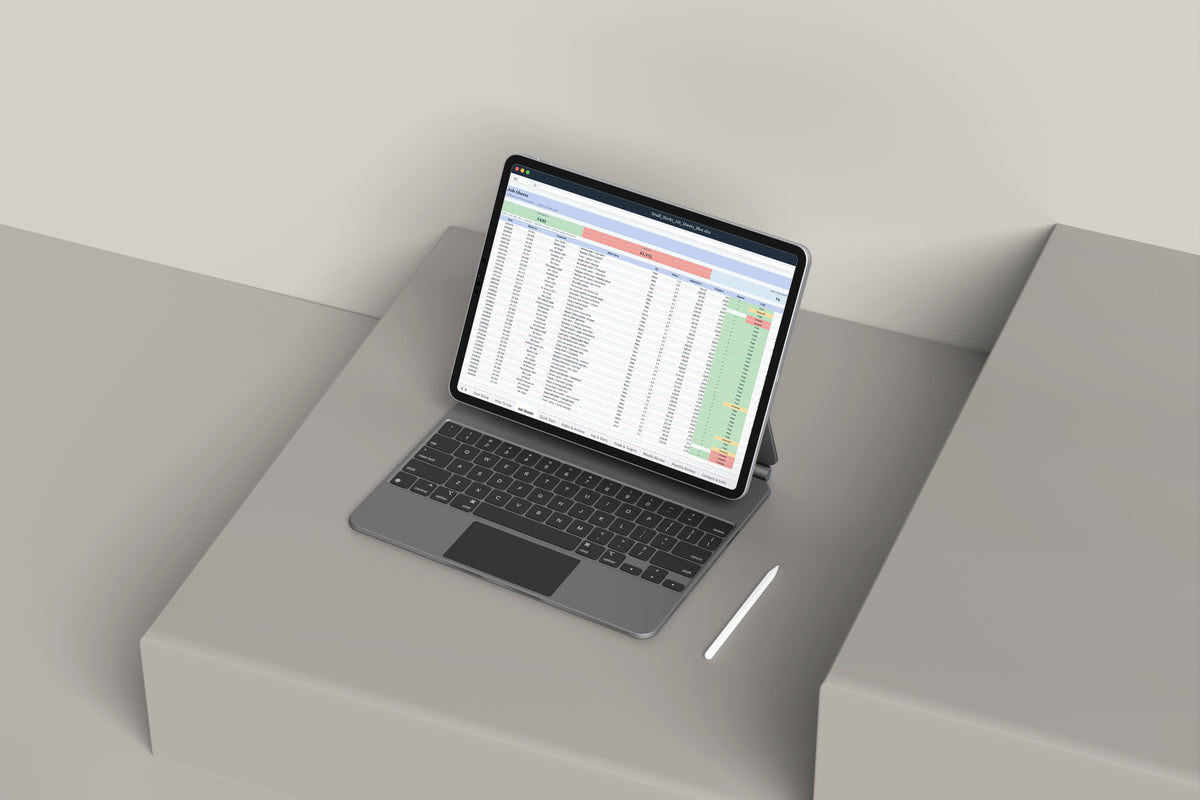 Small Works Job Sheets Excel template on an iPad with keyboard